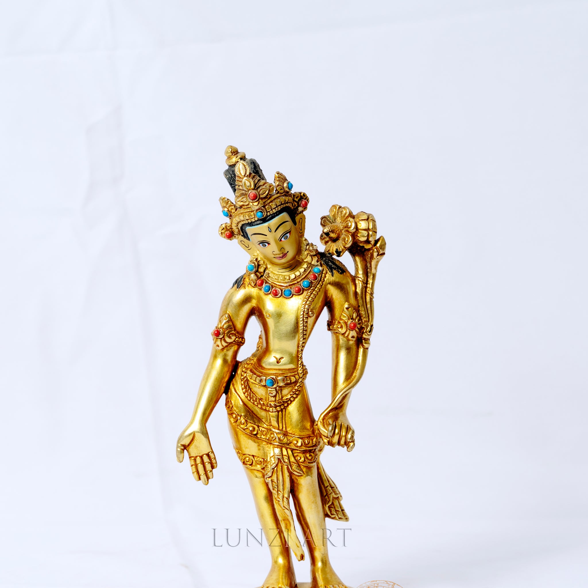 Gilded copper statue of Padmapani Lokeshwor holding a lotus
