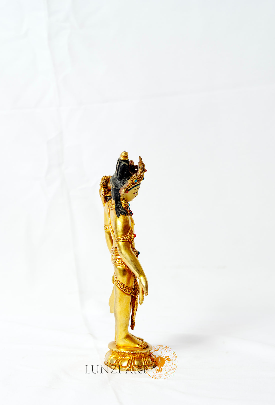 Gilded copper statue of Padmapani Lokeshwor holding a lotus
